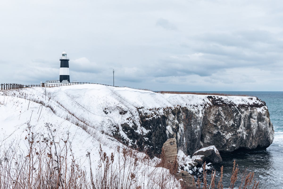 Lighthouse on snowy cliffs overlooking the Sea of Okhotsk in Abashiri Hokkaido