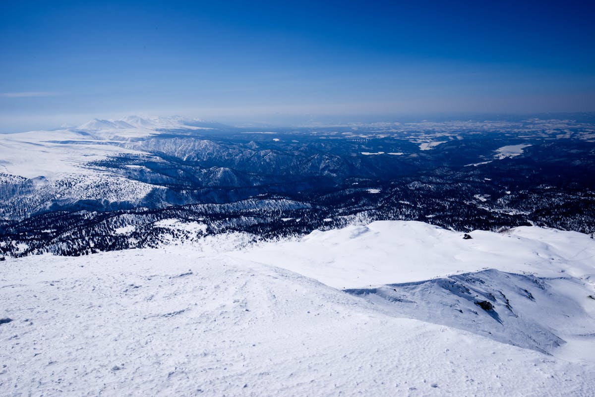 Snow-covered mountains and forests in winter Hokkaido