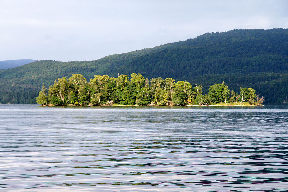Lake Akan crater lake surrounded by forested mountains in Kushiro Hokkaido
