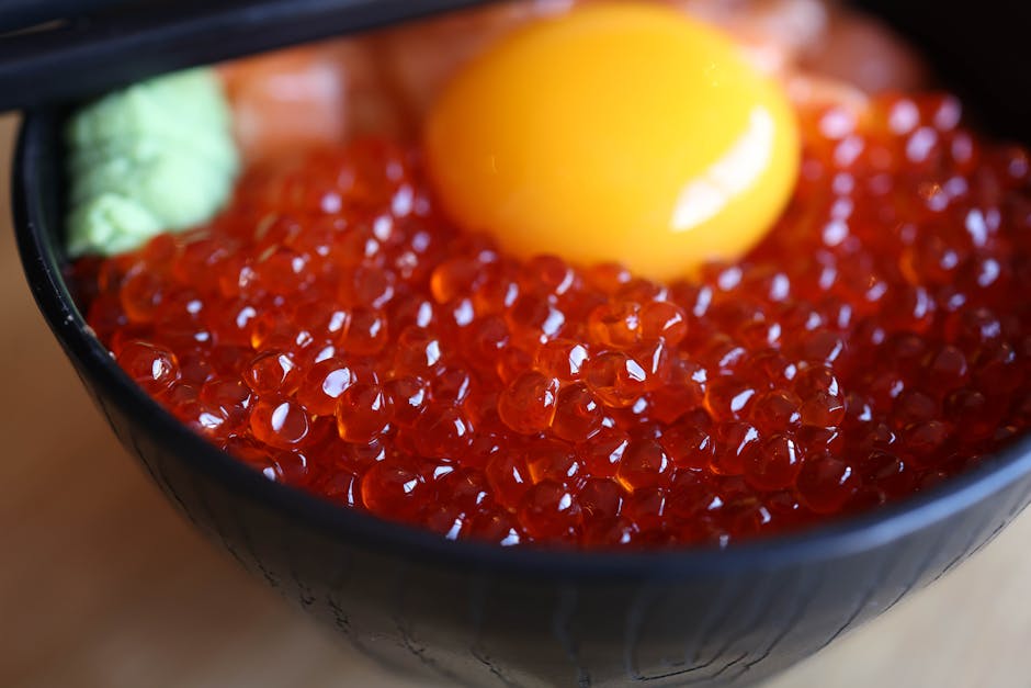 Fresh seafood donburi with ikura salmon roe at a Japanese morning market