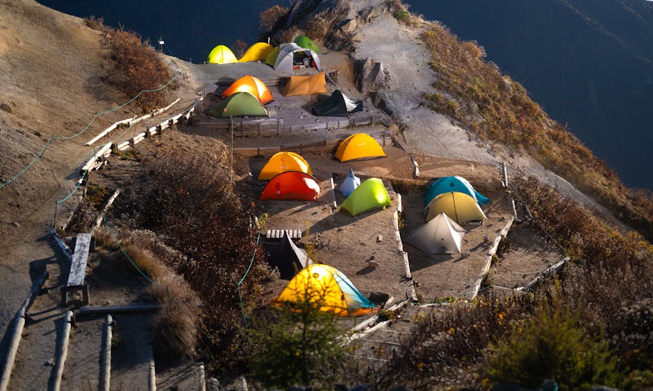 Aerial view of colorful camping tents pitched in the Japanese Alps