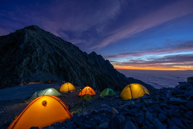 Tent at a mountain campsite in Japan with sea of clouds at sunset
