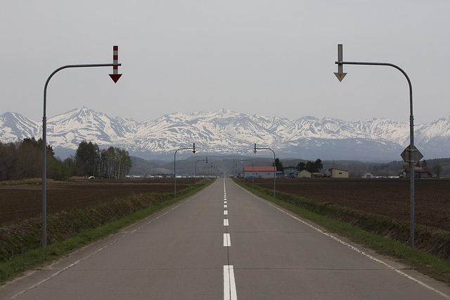 Winter road with mountain views in Biei Hokkaido Japan