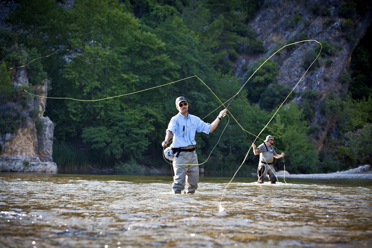 Angler fly fishing in a river