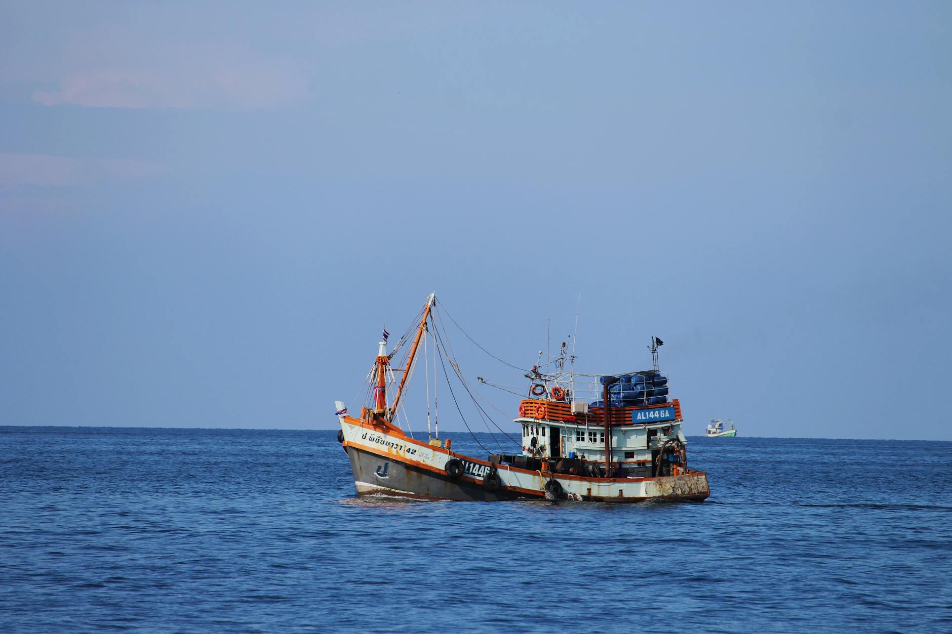 Fishing boat navigating the ocean