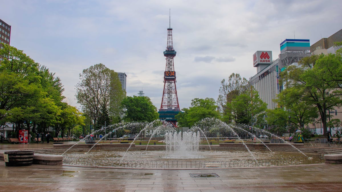 Sapporo TV Tower with fountain in Odori Park, Hokkaido