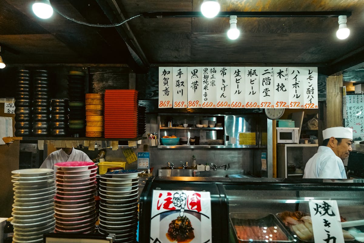 Colorful interior of a traditional Japanese sushi bar with stacked plates