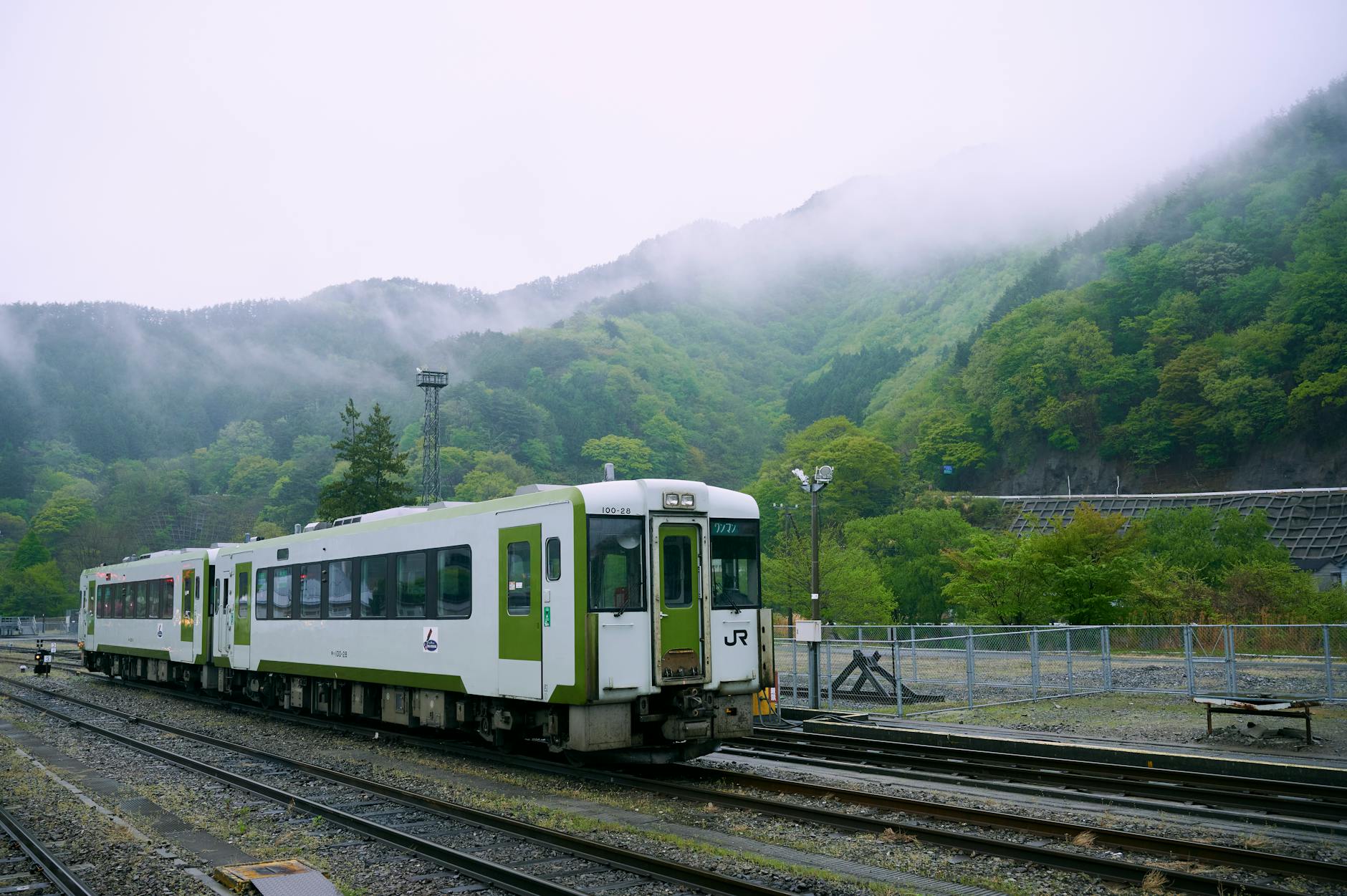 Train traveling through Japanese countryside