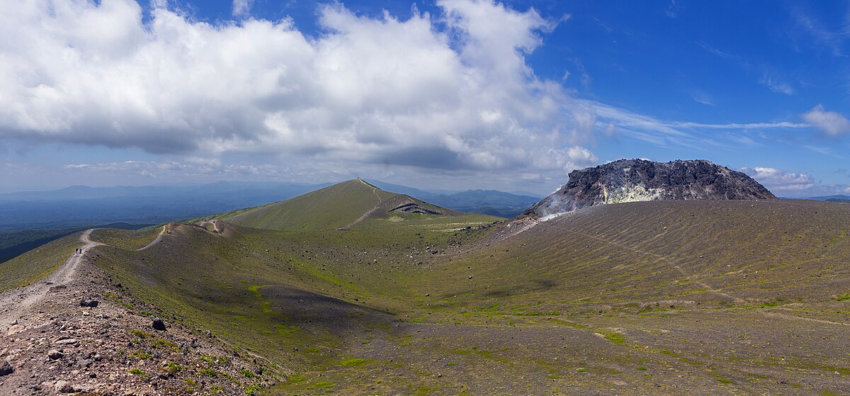 Mount Tarumae volcano with lake and mountains in Hokkaido, Japan