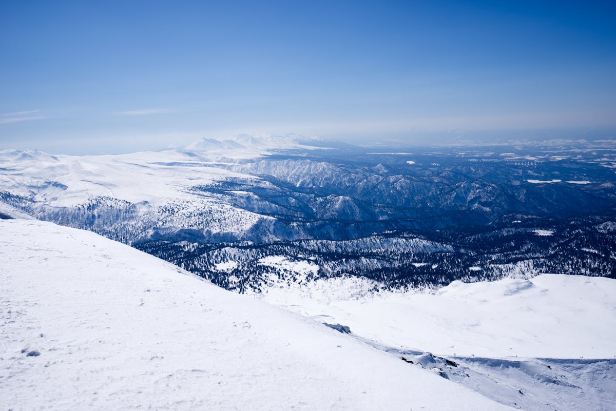 Sweeping snowy mountain landscape in Hokkaido Japan