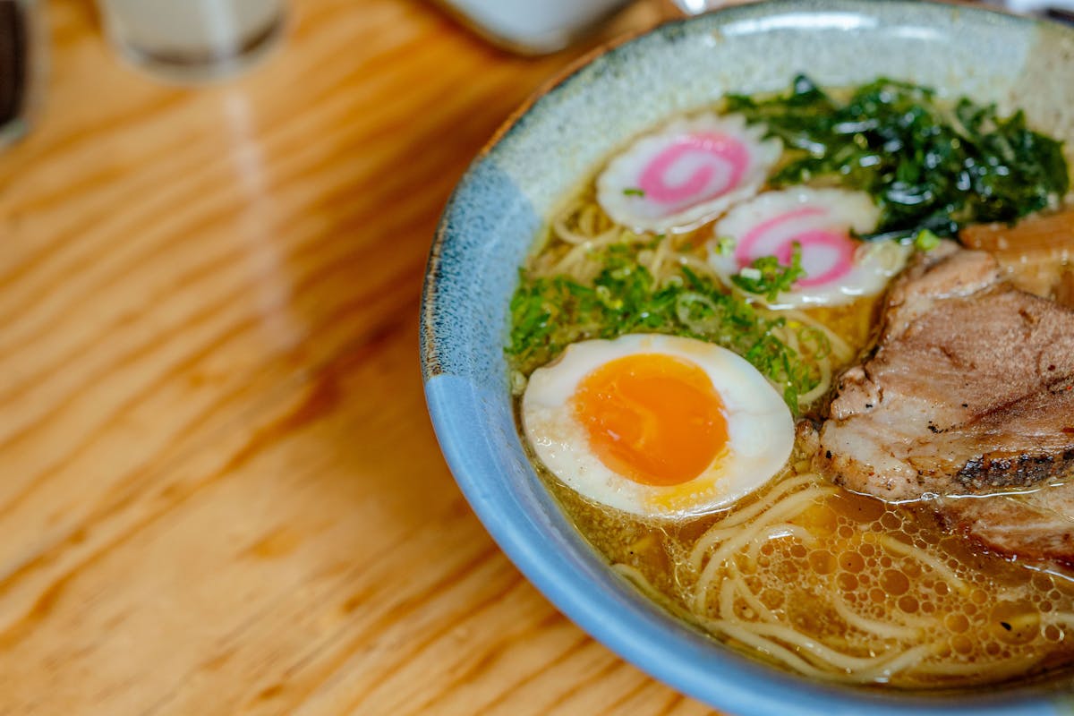 Close-up of a bowl of Japanese ramen with noodles egg and toppings