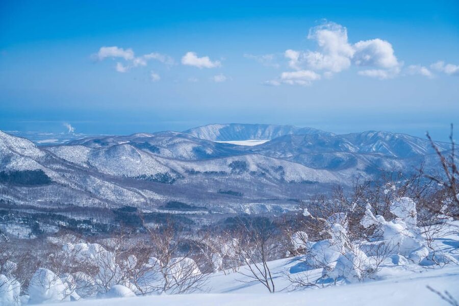 Noboribetsu: Orofure Pass Snowshoeing Tour - The panorama toward Mt. Orofure, Mt. Yotei, and Lake Toya