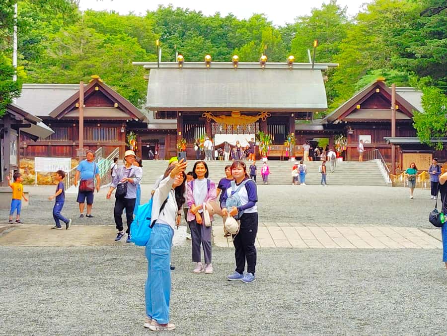 Sapporo: Hokkaido Shrine Tour with Rituals, History & Sweets - Starting beneath Maruyama Park’s great torii
