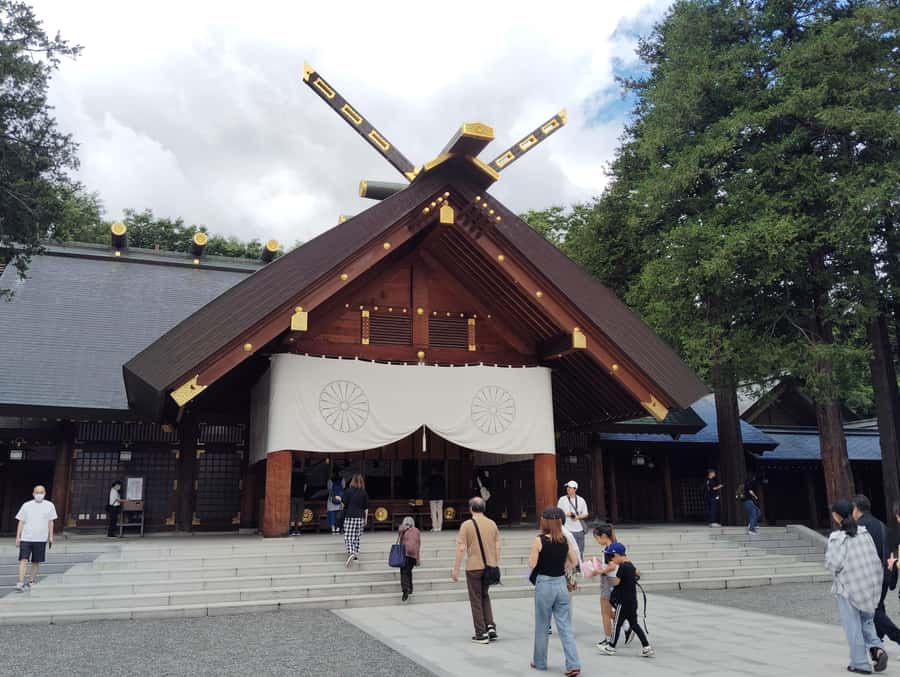 Sapporo: Hokkaido Shrine Tour with Rituals, History & Sweets - Drawing the Ezo Squirrel Omikuji