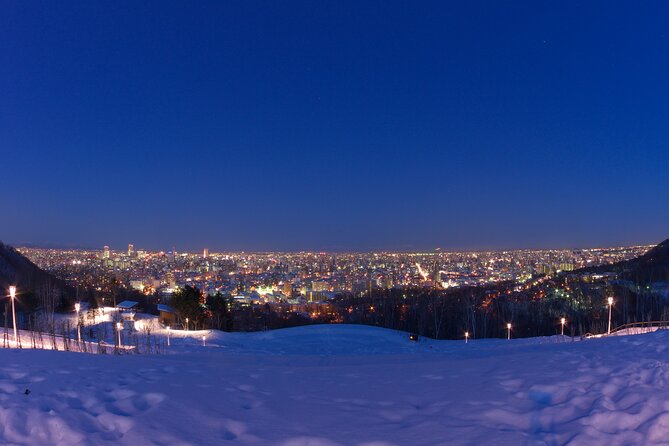 Sapporo Night Hike and Night View Private Guided Experience - Snowshoeing through a quiet forest after dark