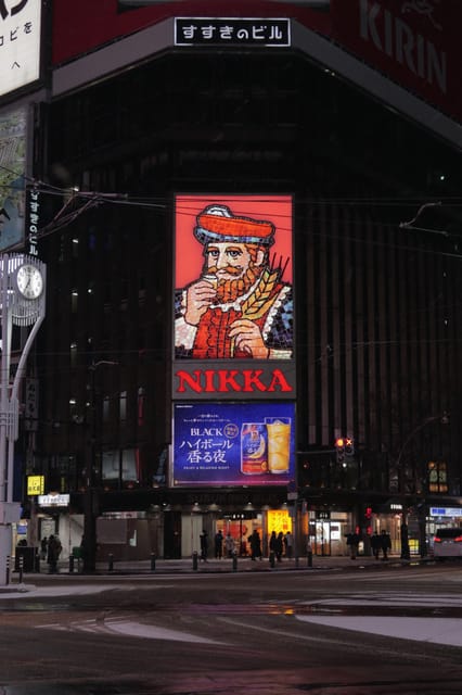 Sapporo: Nightlife Bar Hopping Tour with Local Guide - The first bar: one included drink and local snacks